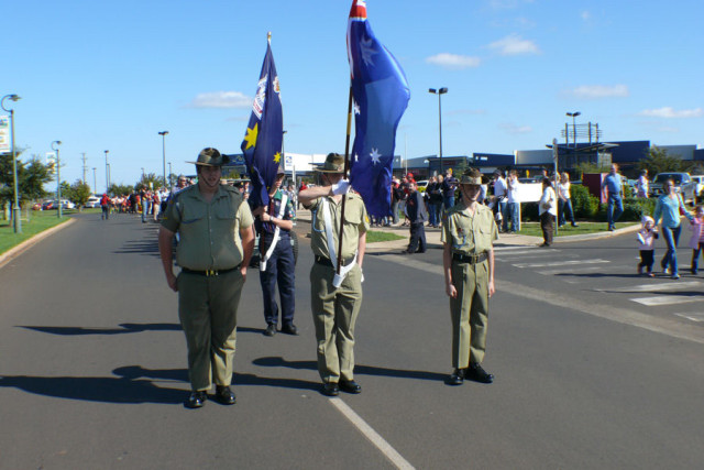 ANZAC Day March RSL Flag Parade Flagpoles White Flagpole Holders Ceremonial Cotton Gloves Highfields RSL Queensland 